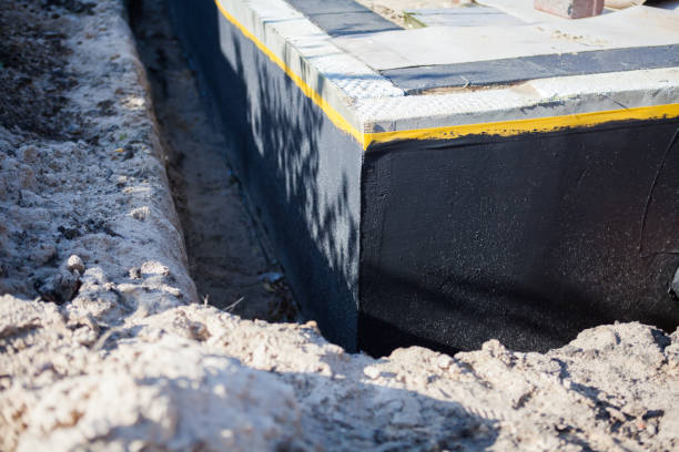 Professional Exterior Waterproofing technician working in Beaverton, OR